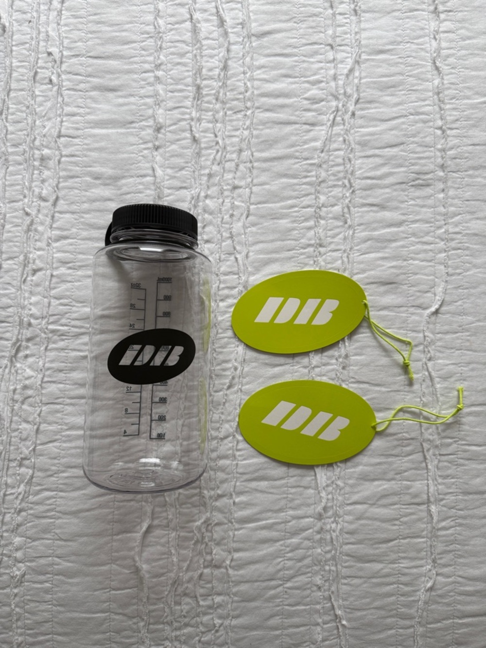 Dairy Boy Sport Clear Water Bottle with Neon Green Tags